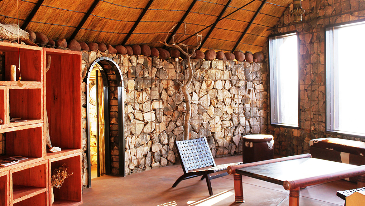 Etaambura’s curved lounge and dining room are airy, large and comfortable. Himba-owned CSN and the local Orupembe Conservancy are majority shareholders of this special small lodge built on the highest hill in the area